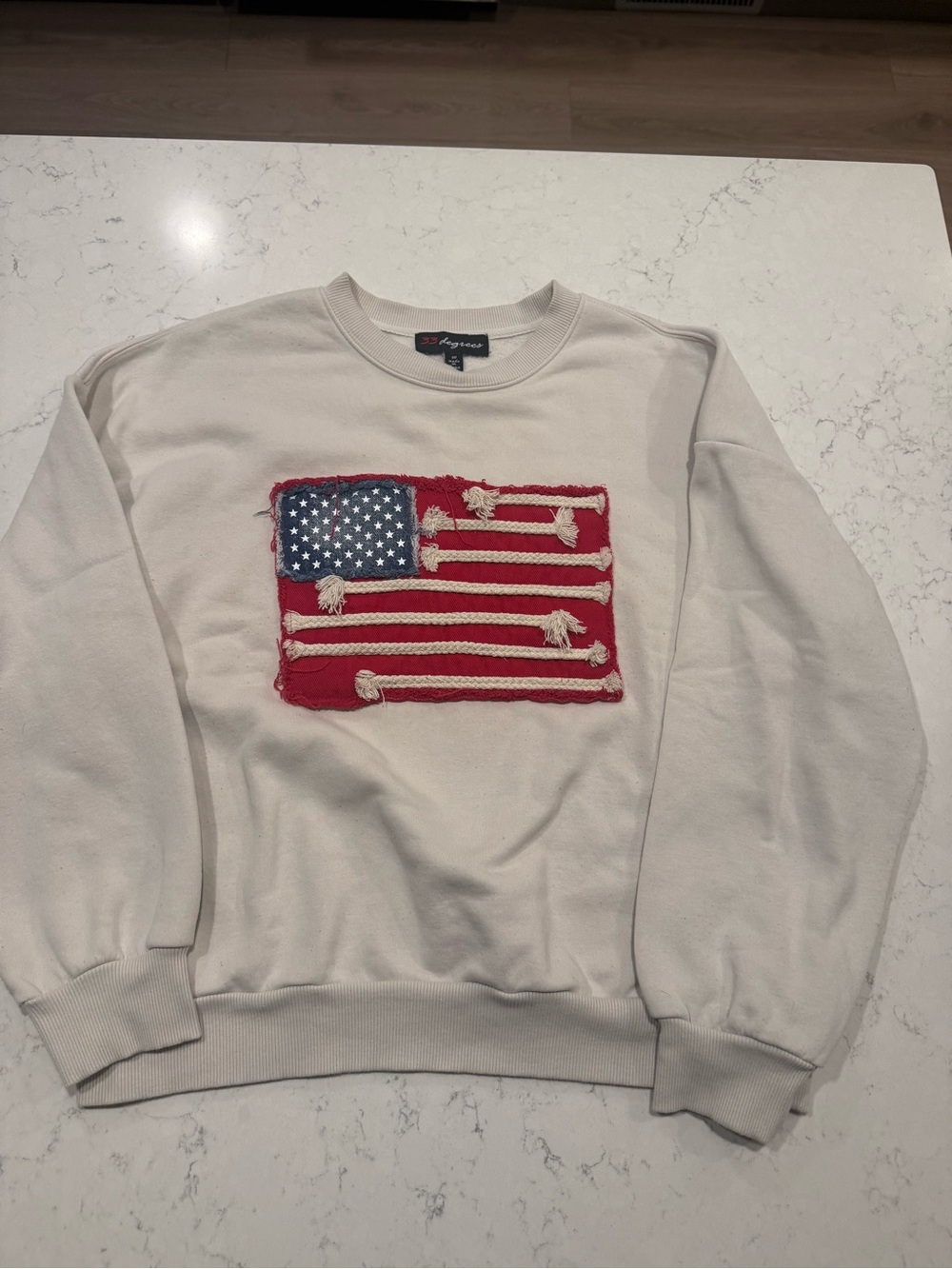 Women’s Cream Crewneck Sweater with Distressed American Flag